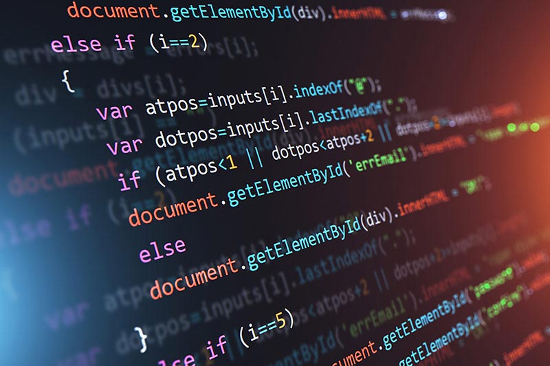 Computer monitor with programming code on it